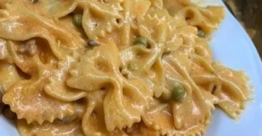 Dish of Farfalle alla Boscaiola with mushrooms and sausage
