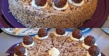 Una squisita torta decorata con frutta fresca e crema